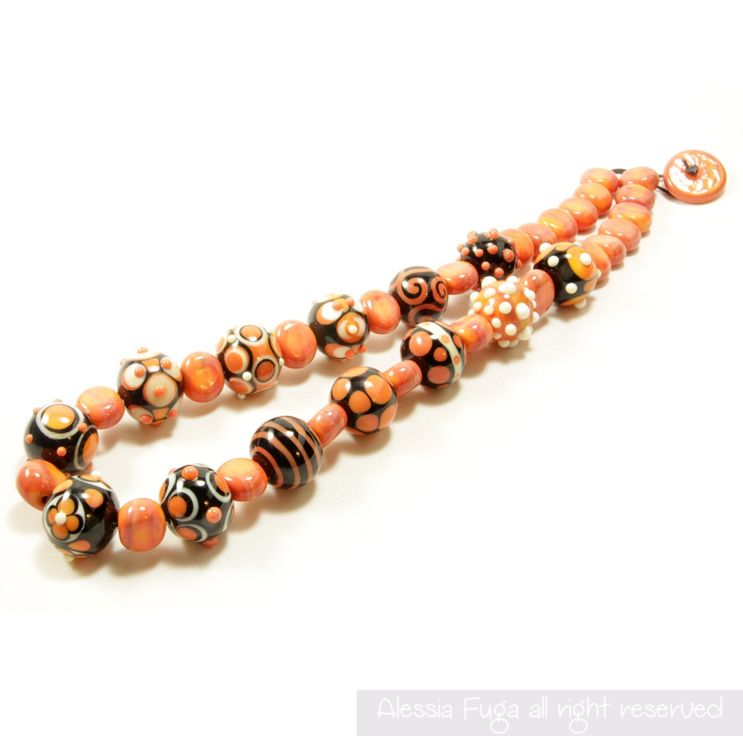 Glass necklace "13" in coral made by Alessia Fuga