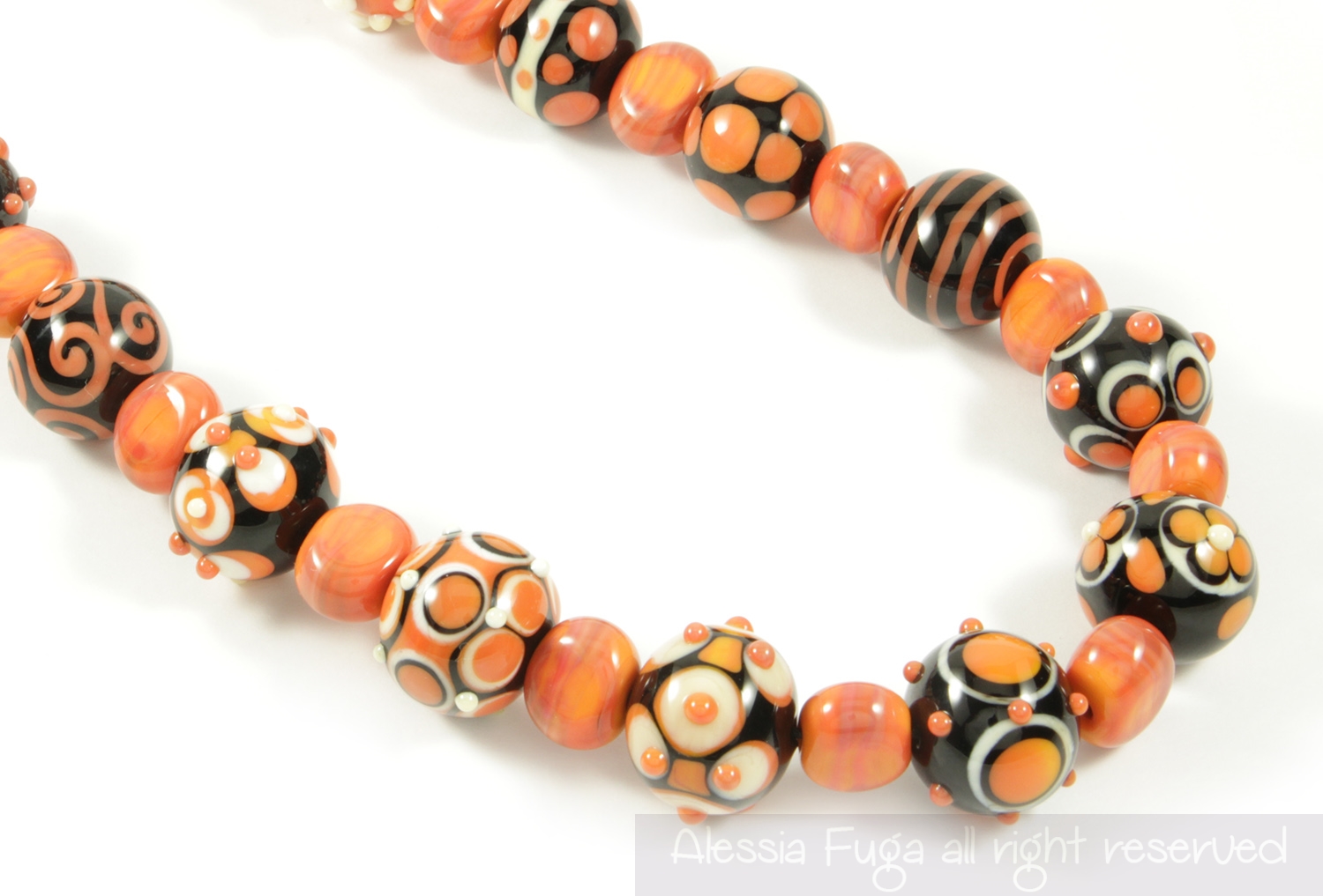 Glass necklace "13" in coral made by Alessia Fuga