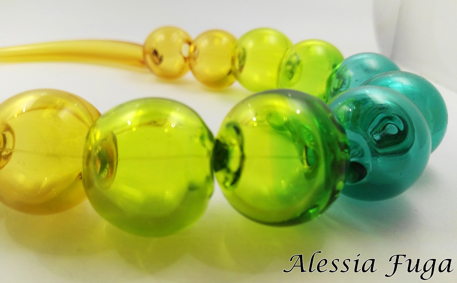 Blown beads necklace in topaz and green