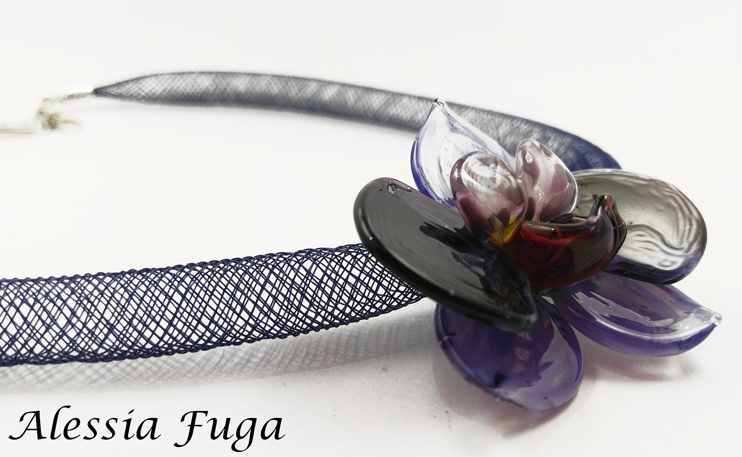 Lampwork wisteria orchlid pendant on a plastic mesh tube necklace side view