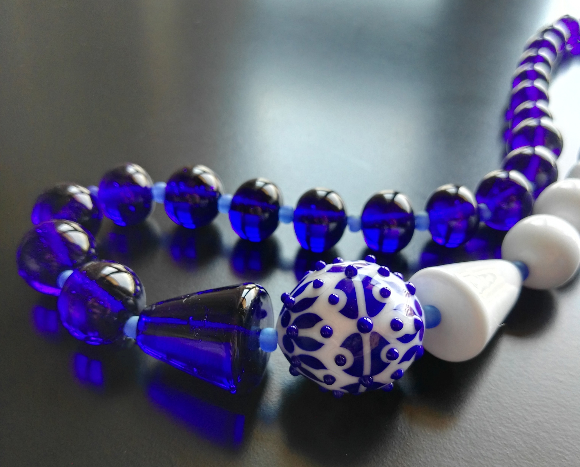 Blue glass necklace by Alrssia Fuga