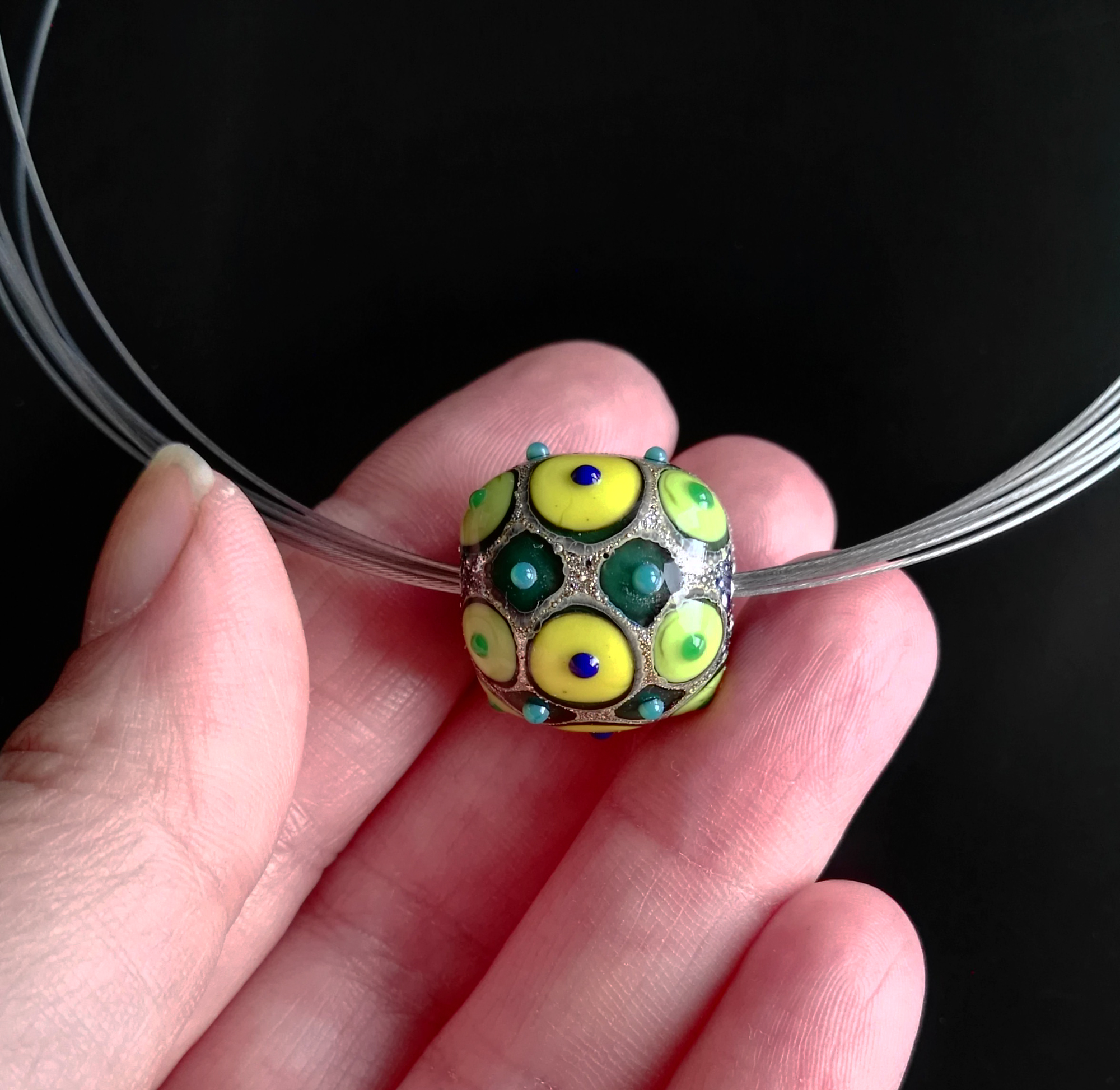 Yellow and green Fenice glass bead