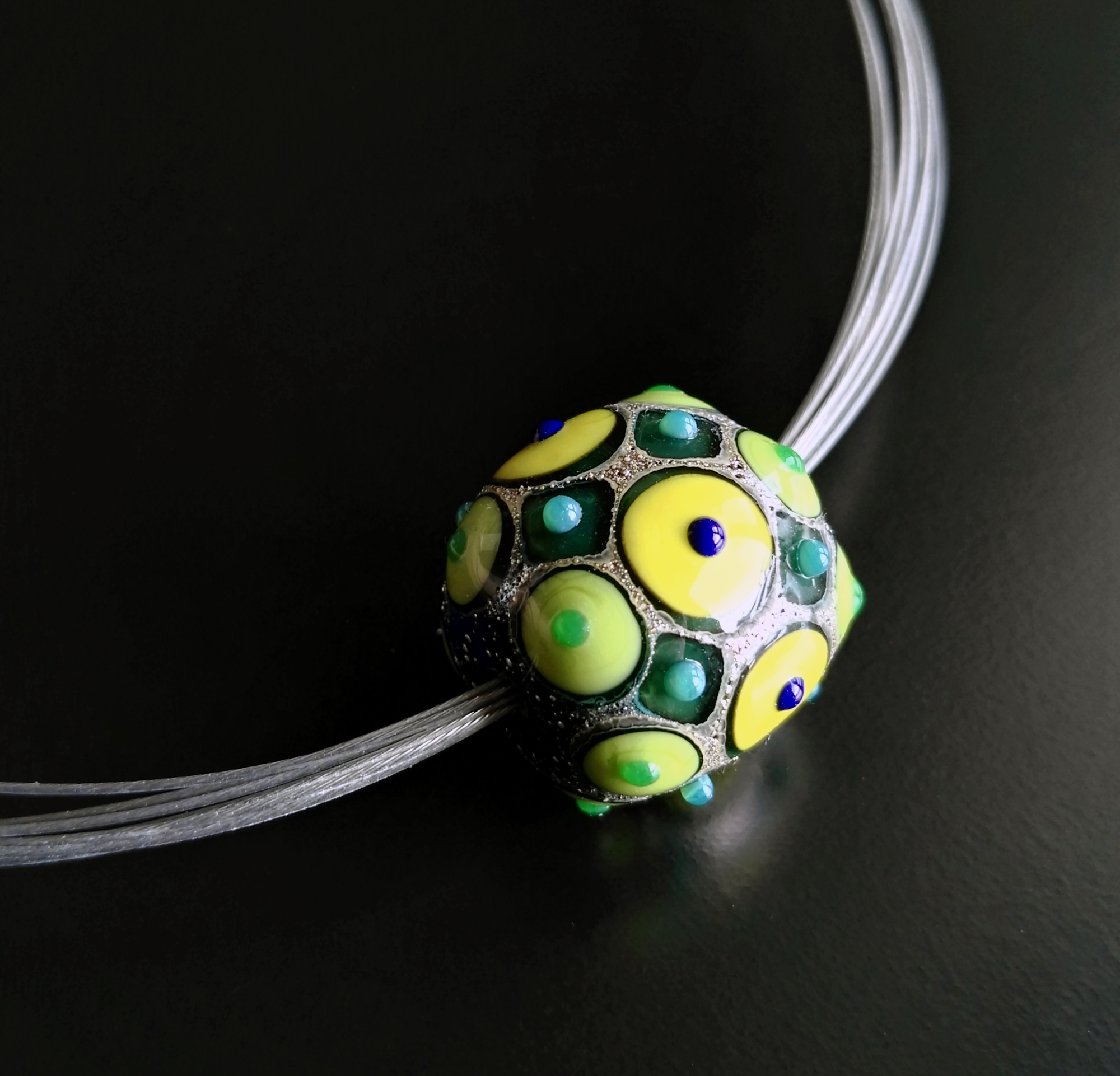 Yellow and green Fenice glass bead